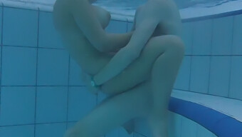 A Young Adult Couple Indulges In Underwater Intimacy, Showcasing Their Ample Bosoms And Insatiable Desires.