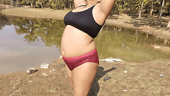 Asian Village Girl Practices Yoga And Takes A Refreshing Bath In The River