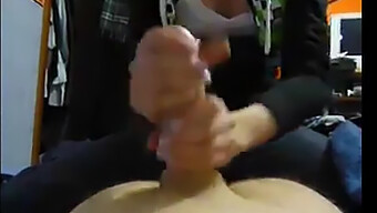 Real Amateur Couple Giving A Handjob To A Huge Cock