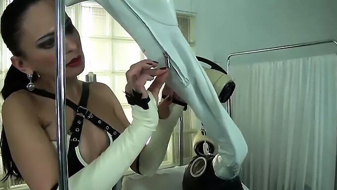 Femdom Mistress dominates with breathplay and toys